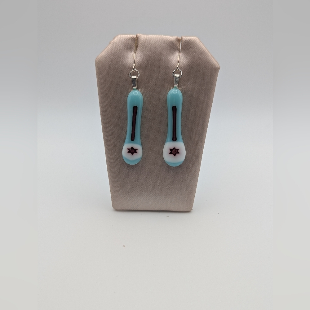 Artisan handmade Fused glass red star of David on seafoam. Sterling hooks